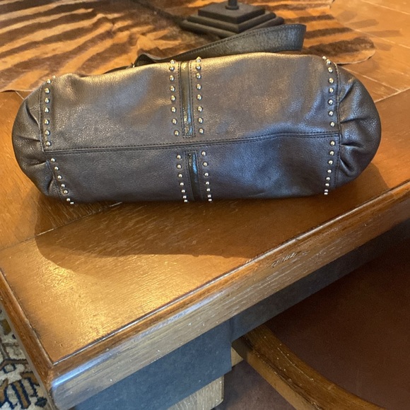 Pewter colored Brighton purse. Top and side pockets have magnetic closure. - Picture 8 of 11